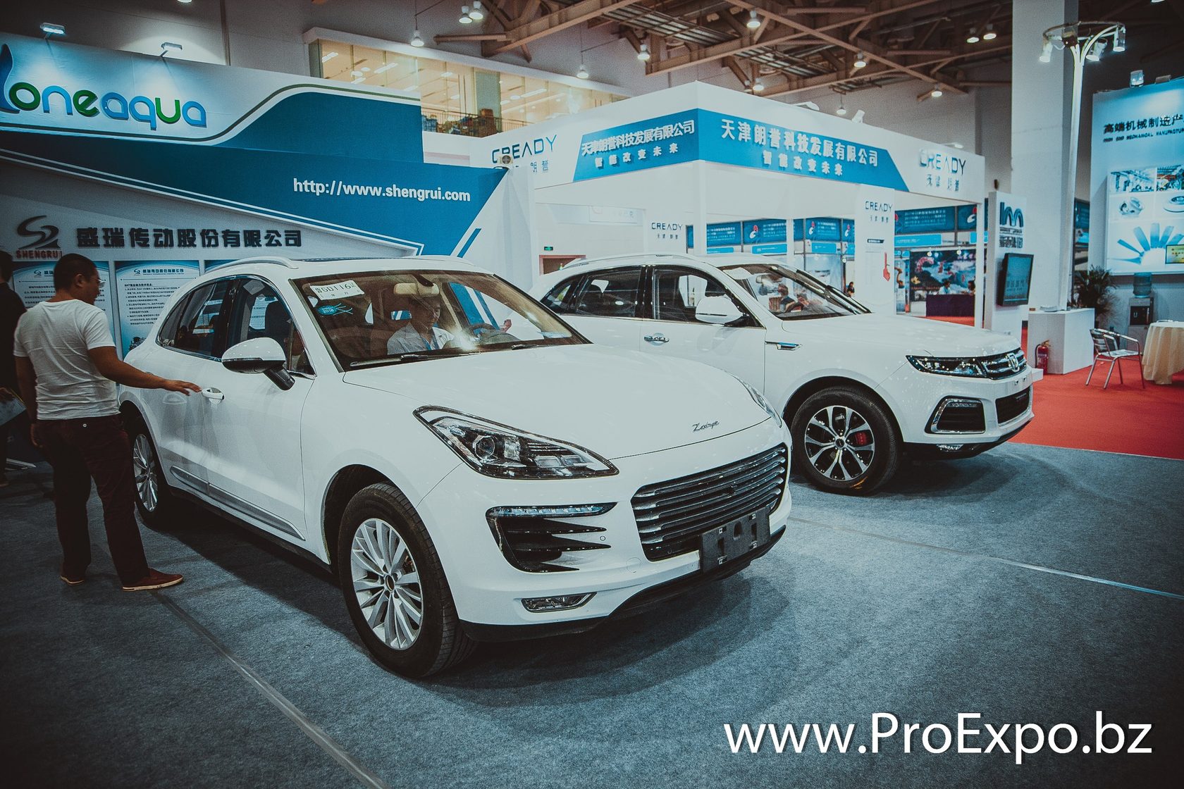 Business trip participants at an expo hall